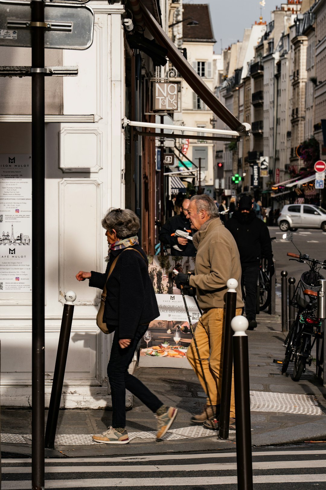 celebrity walking in paris street