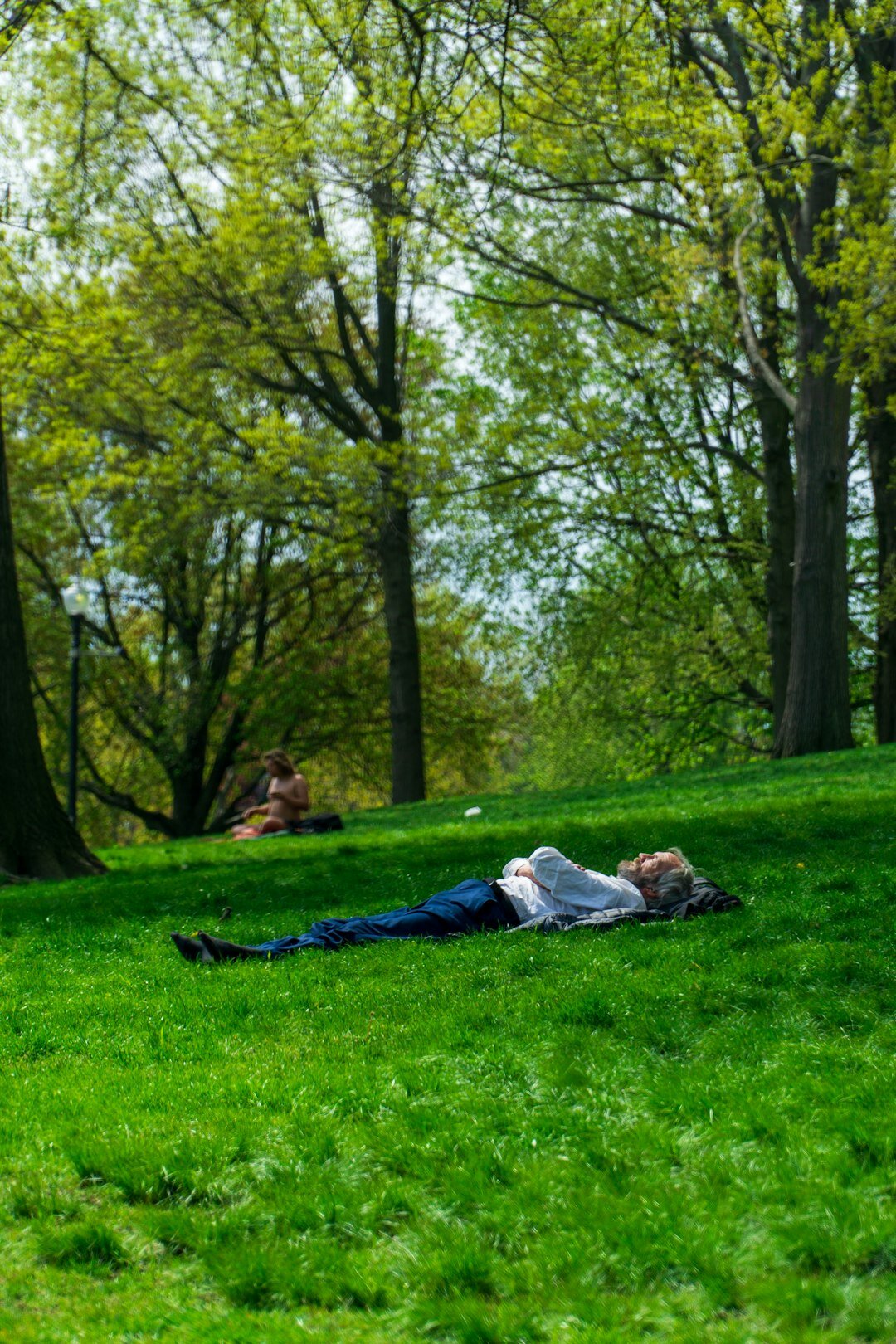 actor relaxing in park