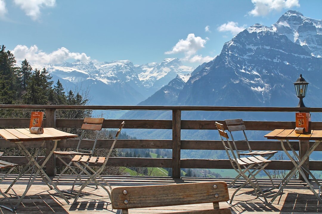 Mountain restaurant terrace with panoramic Alps view